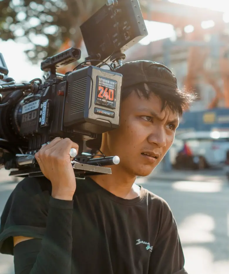 Camera crew at a roadside report